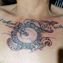 Clock tattoo on chest.
